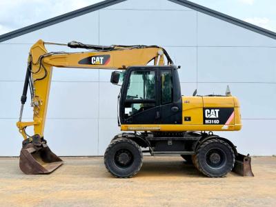 Caterpillar M315D - Triple Boom / Quick Coupler en vente par Boss Machinery