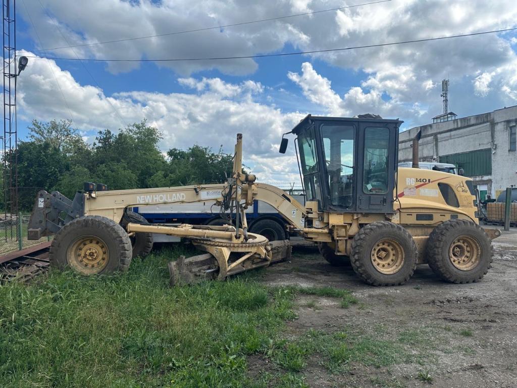 New Holland RG 140 Photo 1