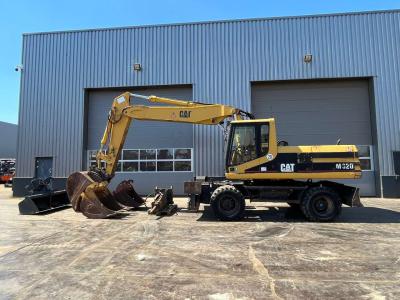 Caterpillar M320 complete with 4 buckets and hammer available en vente par Big Machinery