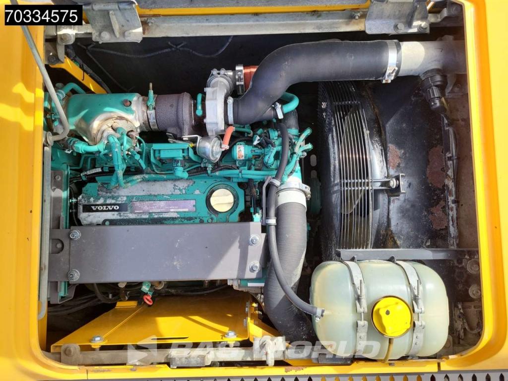 Volvo EW140 D Outriggers + Blade Photo 12
