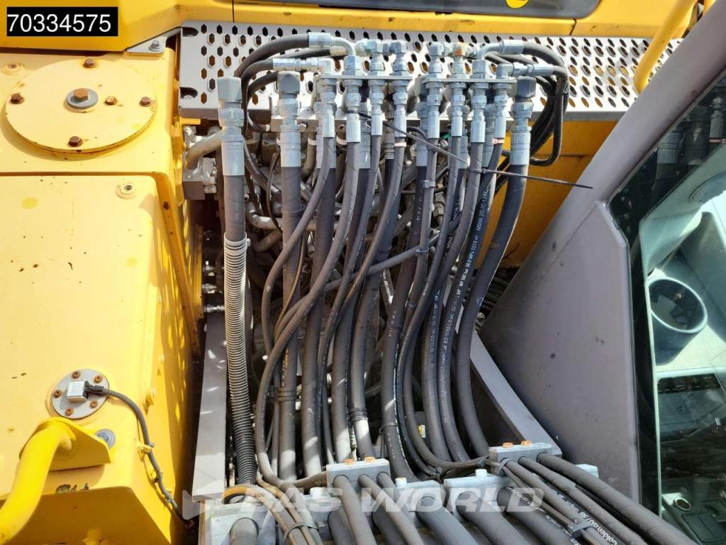 Volvo EW140 D Outriggers + Blade Photo 15