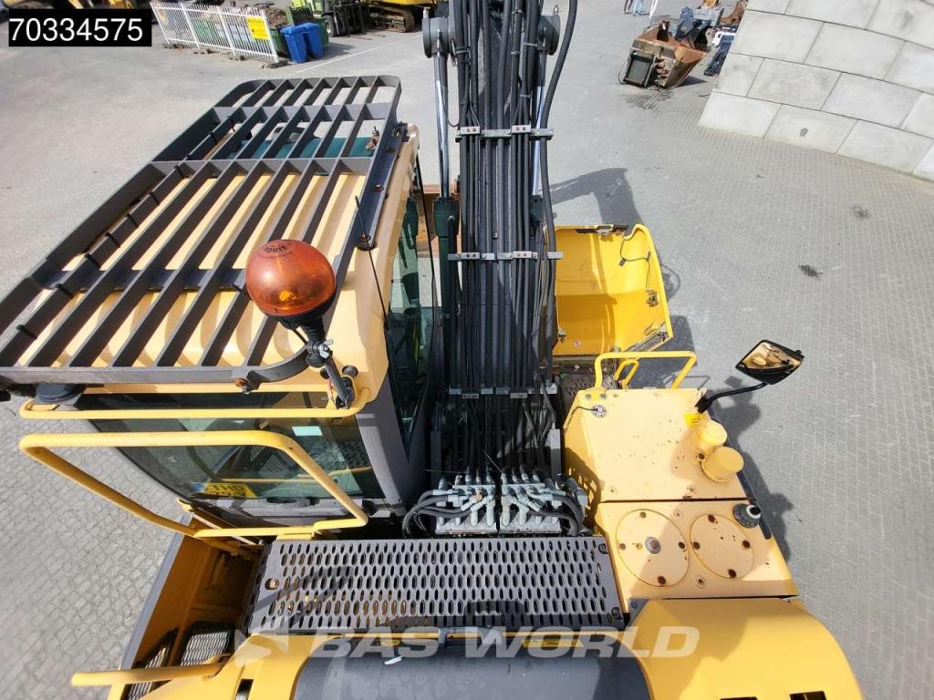 Volvo EW140 D Outriggers + Blade Photo 19