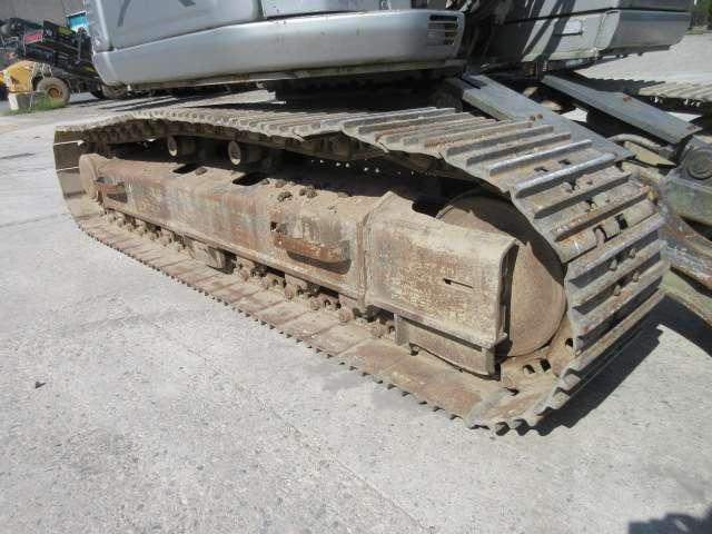 New Holland E135 SR-1ES Photo 10