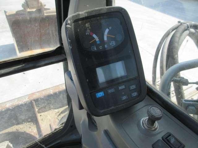 New Holland E135 SR-1ES Photo 22