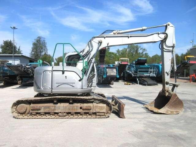 New Holland E135 SR-1ES Photo 4