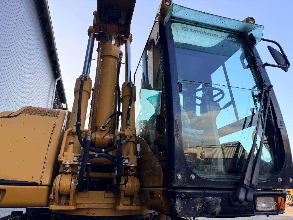 Caterpillar M318C Photo 24