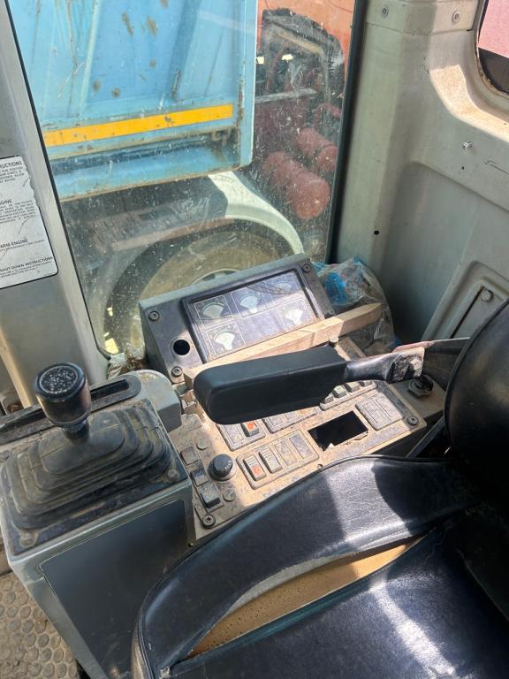 New Holland RG 140 Photo 11