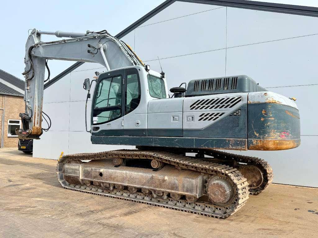 Hyundai Robex 380NLC-9 - Oilquick / Automatic Greasing Photo 3