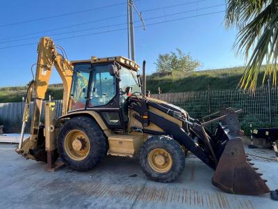 Caterpillar 442D Photo 1