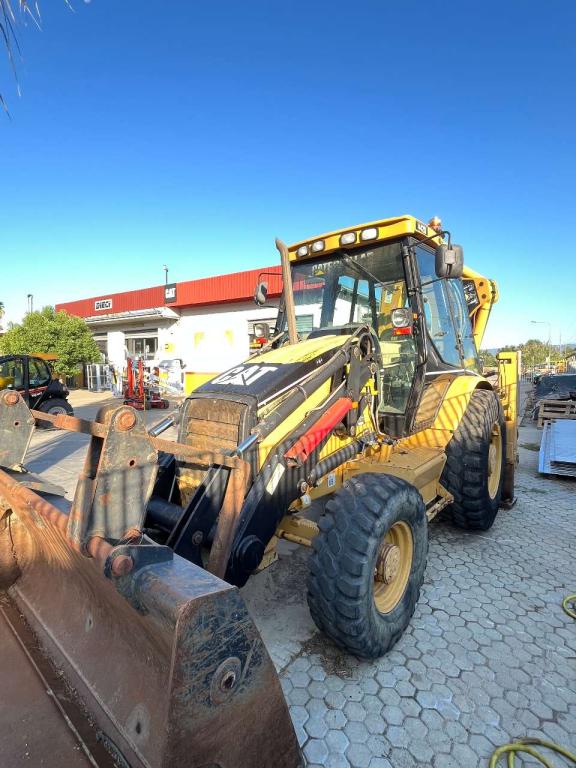 Caterpillar 442D Photo 4