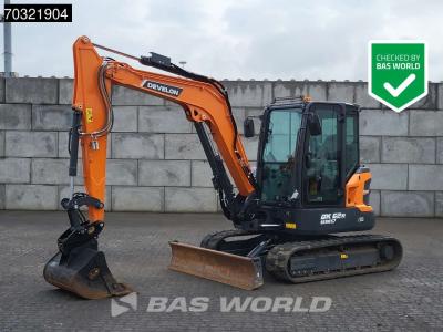 Develon DX62 R-7 A/C en vente par BAS World B.V.