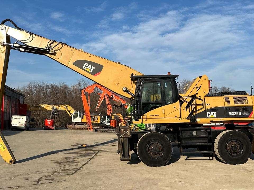 Caterpillar M325D 4X4 Photo 2