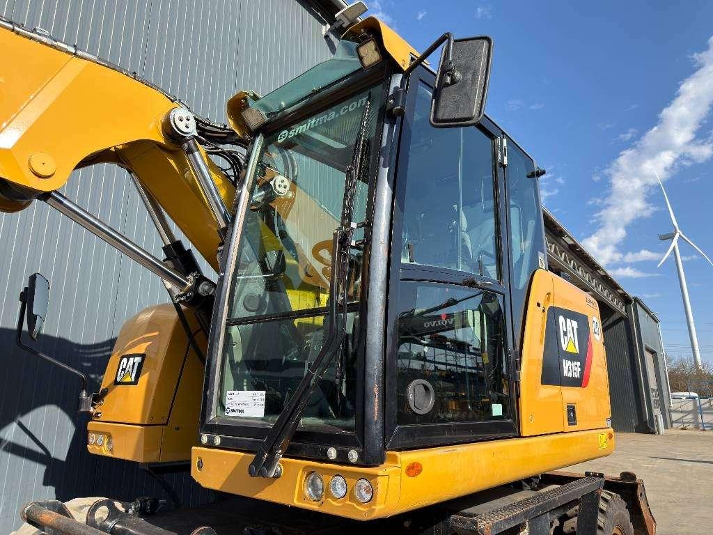 Caterpillar M315F - With OilQuick Photo 6