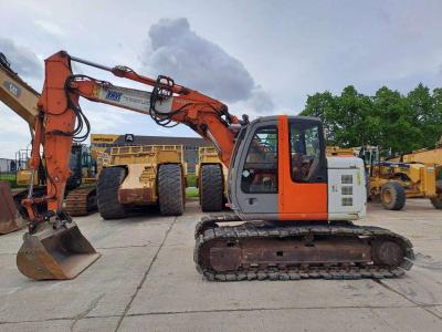 Hitachi ZX135US en vente par Aertssen Trading