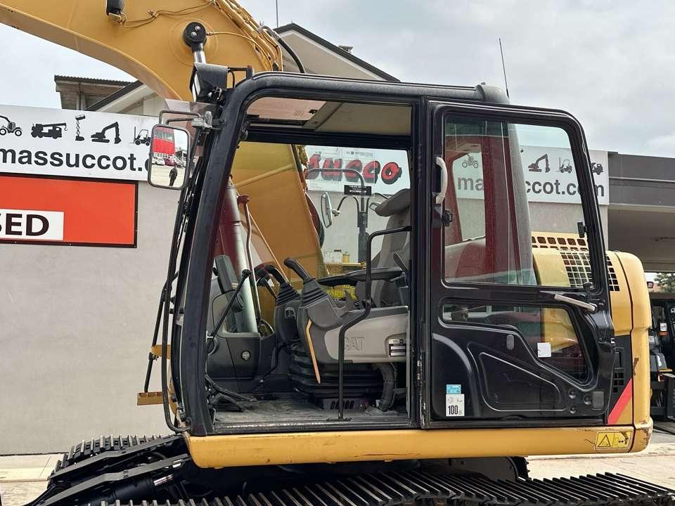 Caterpillar 311D Photo 11
