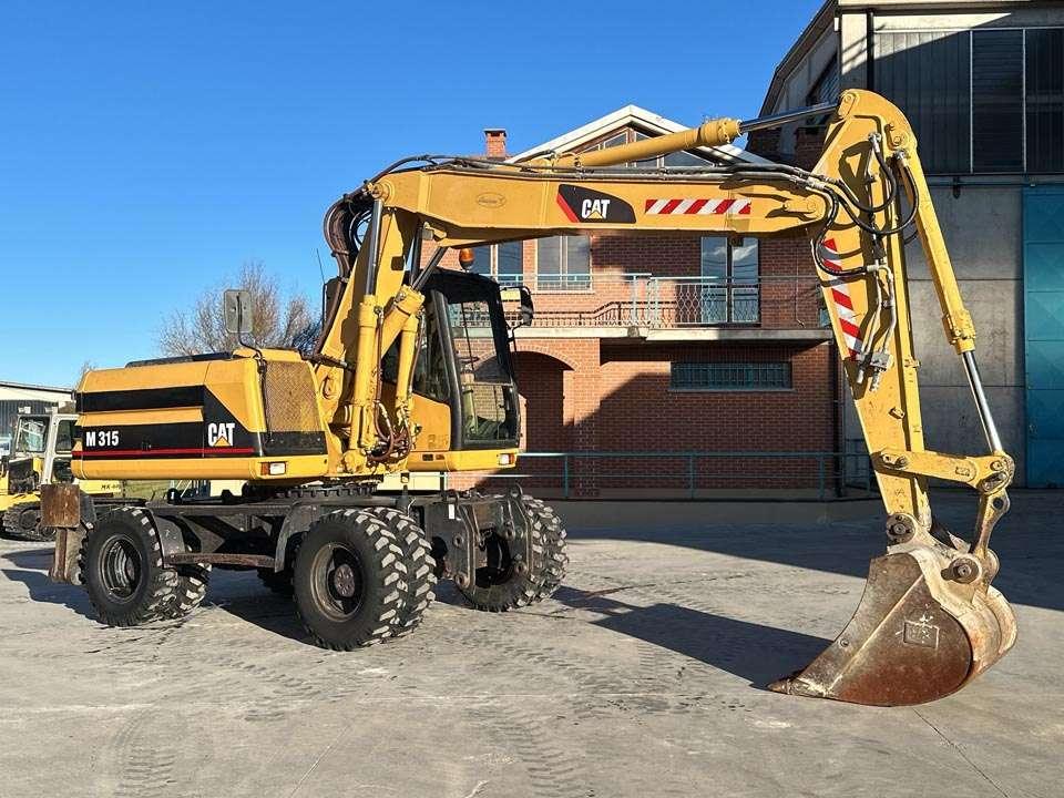 Caterpillar M315 Photo 19