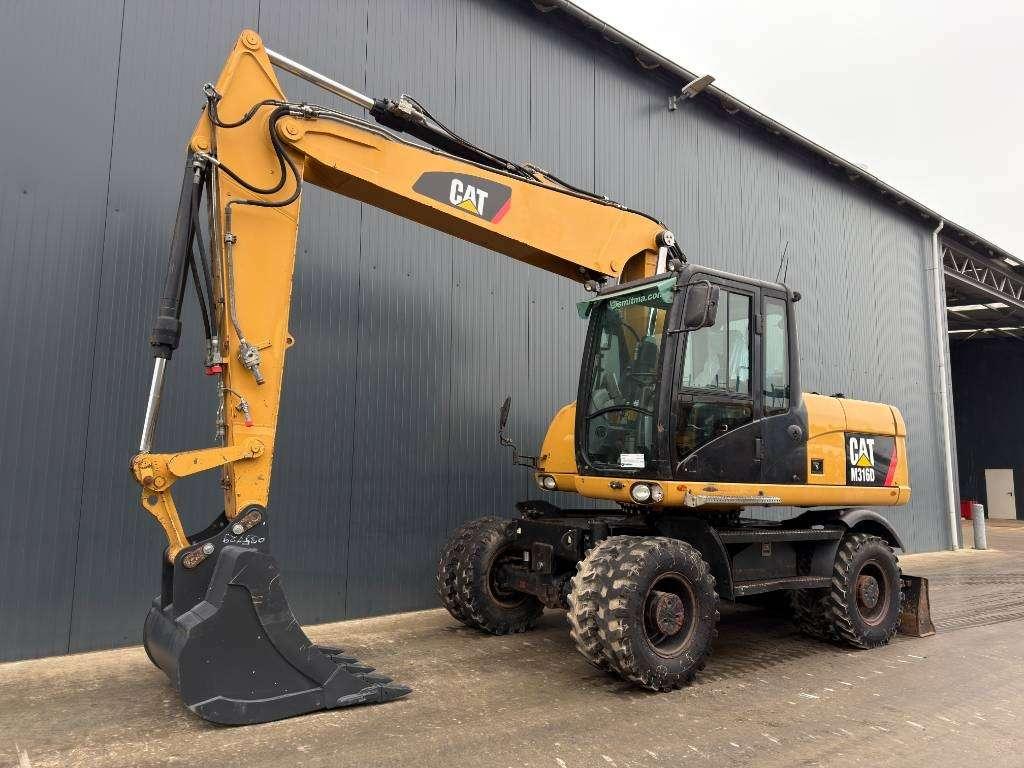 Caterpillar M316D Photo 1