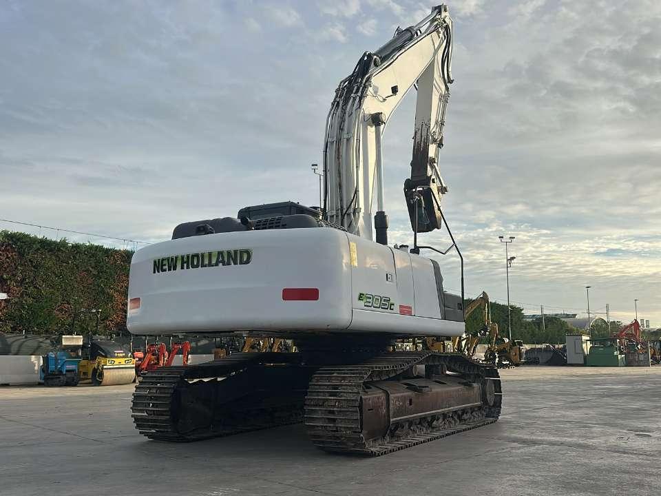 New Holland E 305 C Photo 1