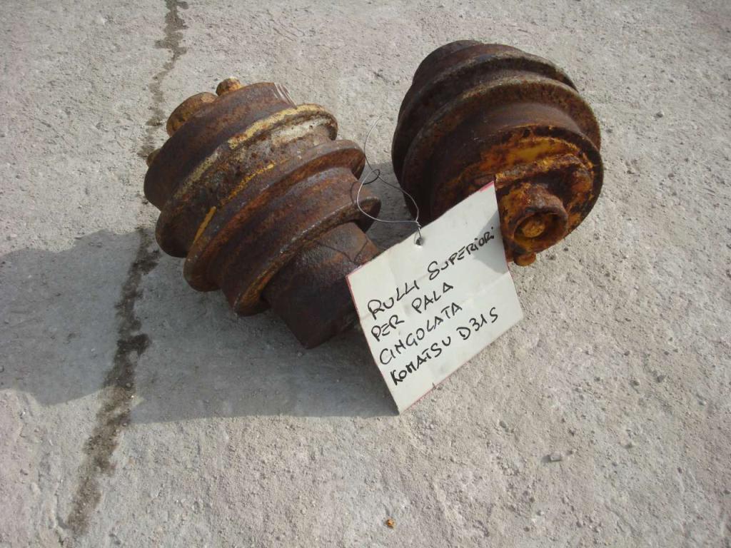 Galets supérieurs pour Komatsu D31S Photo 1