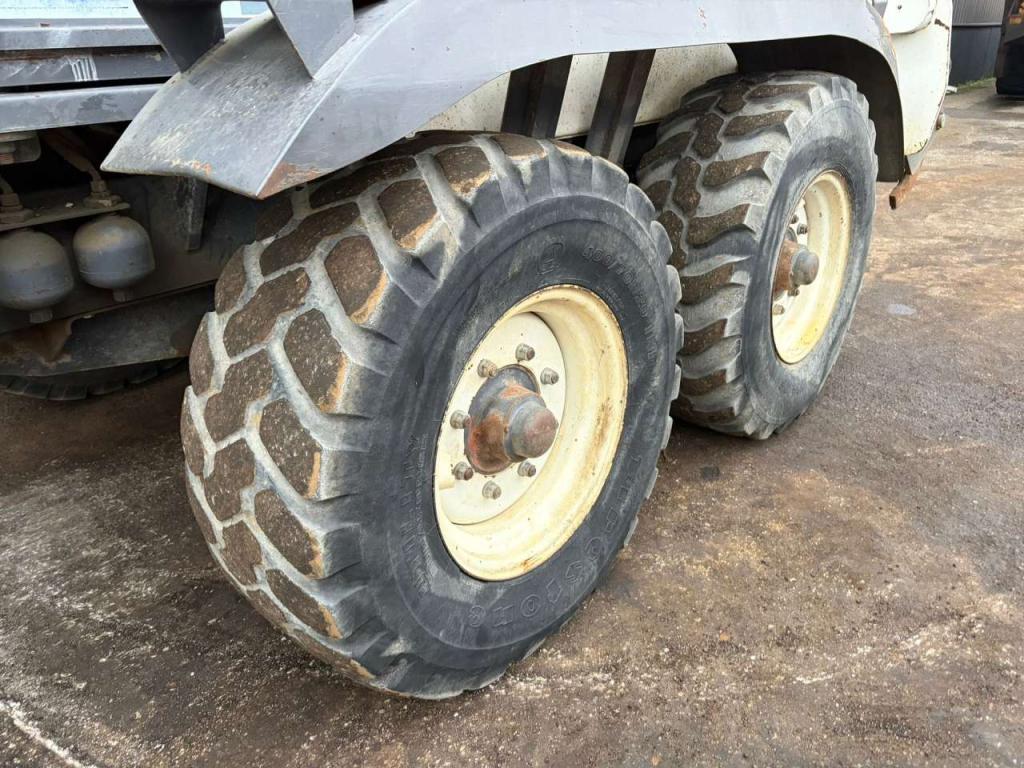 New Holland F106.6/A Photo 16