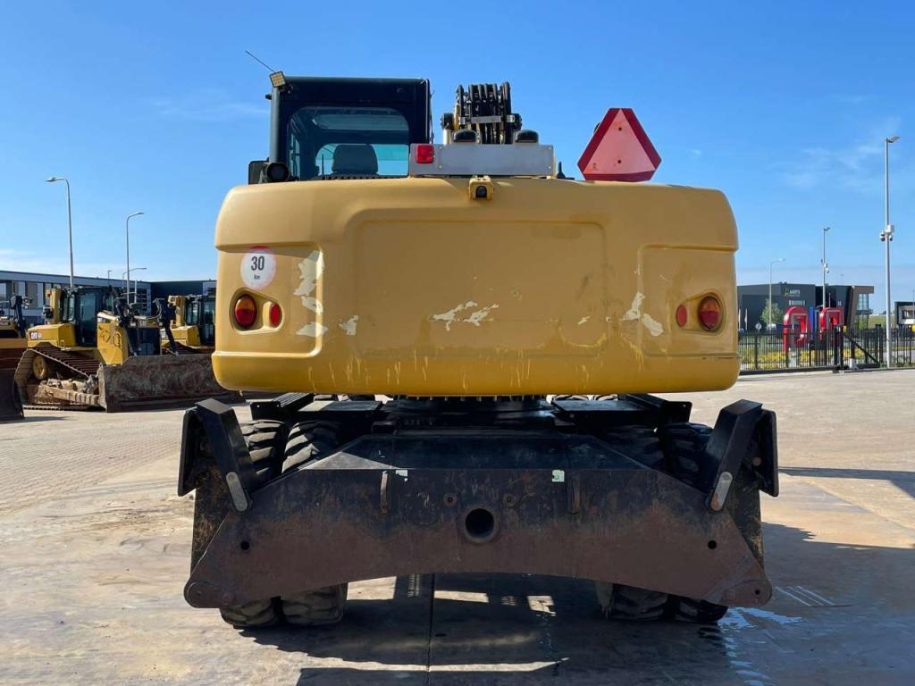 Caterpillar M313D VA - Outriggers + Blade Photo 7