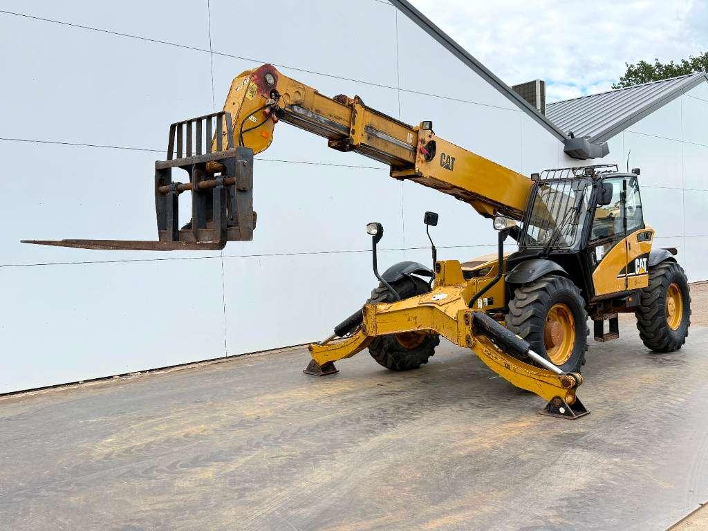 Caterpillar TH460B - 15m Reach / 4 Wheel Steering Photo 2