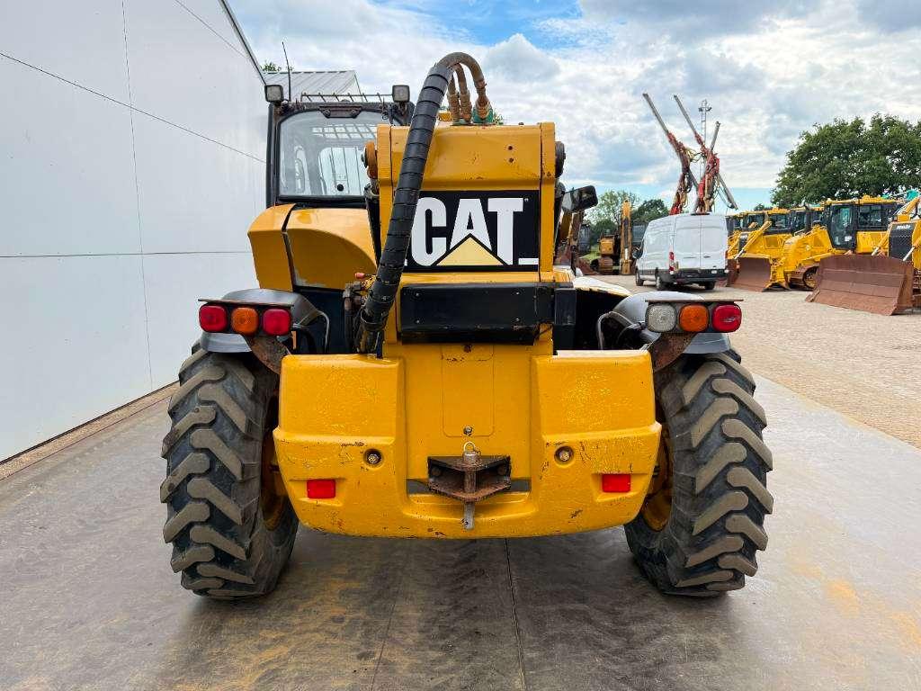 Caterpillar TH460B - 15m Reach / 4 Wheel Steering Photo 4