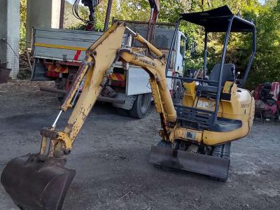 Komatsu PC 12r Photo 1