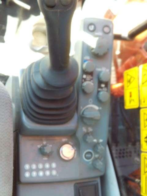Hitachi ZX135US-6 Photo 18
