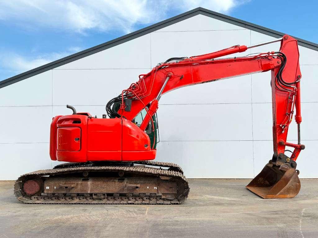 New Holland Kobelco E235B SR-2 - 360° Camera / Hammer lines Photo 6