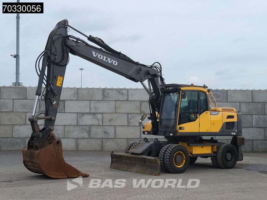 Volvo EW210 D Outrigers + Blade Photo 2