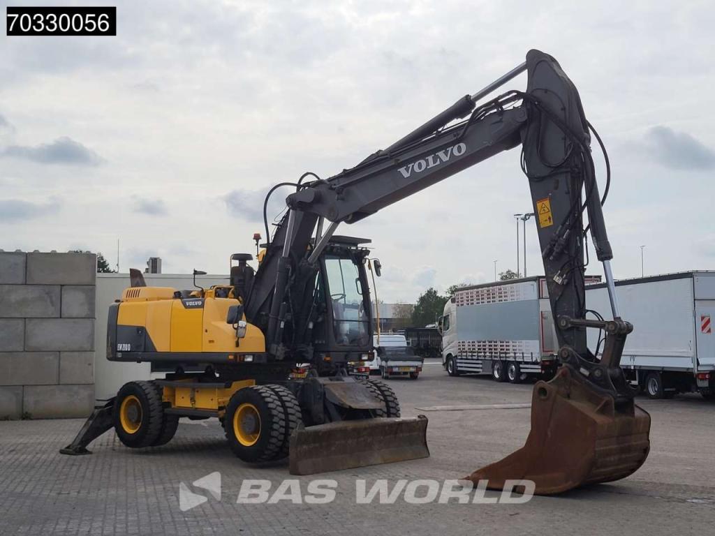 Volvo EW210 D Outrigers + Blade Photo 9